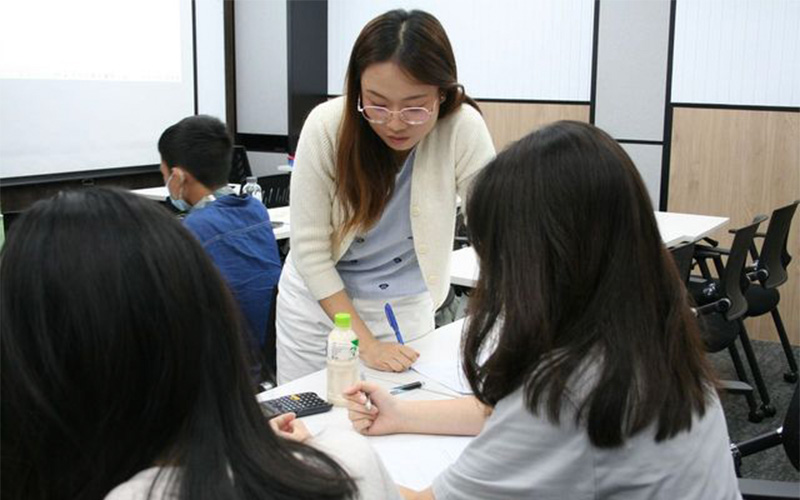 tutor providing guidance to a student