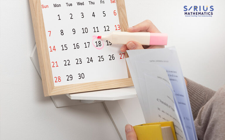 Person marking a calendar date for an E-Math mock exam