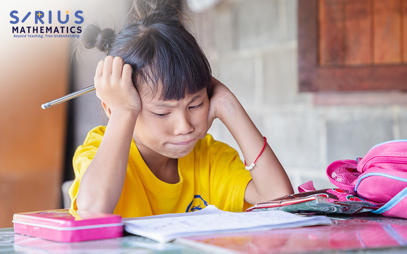 Student feeling frustrated while working on a math problem